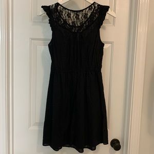 Black ruffle cap sleeve dress with lace